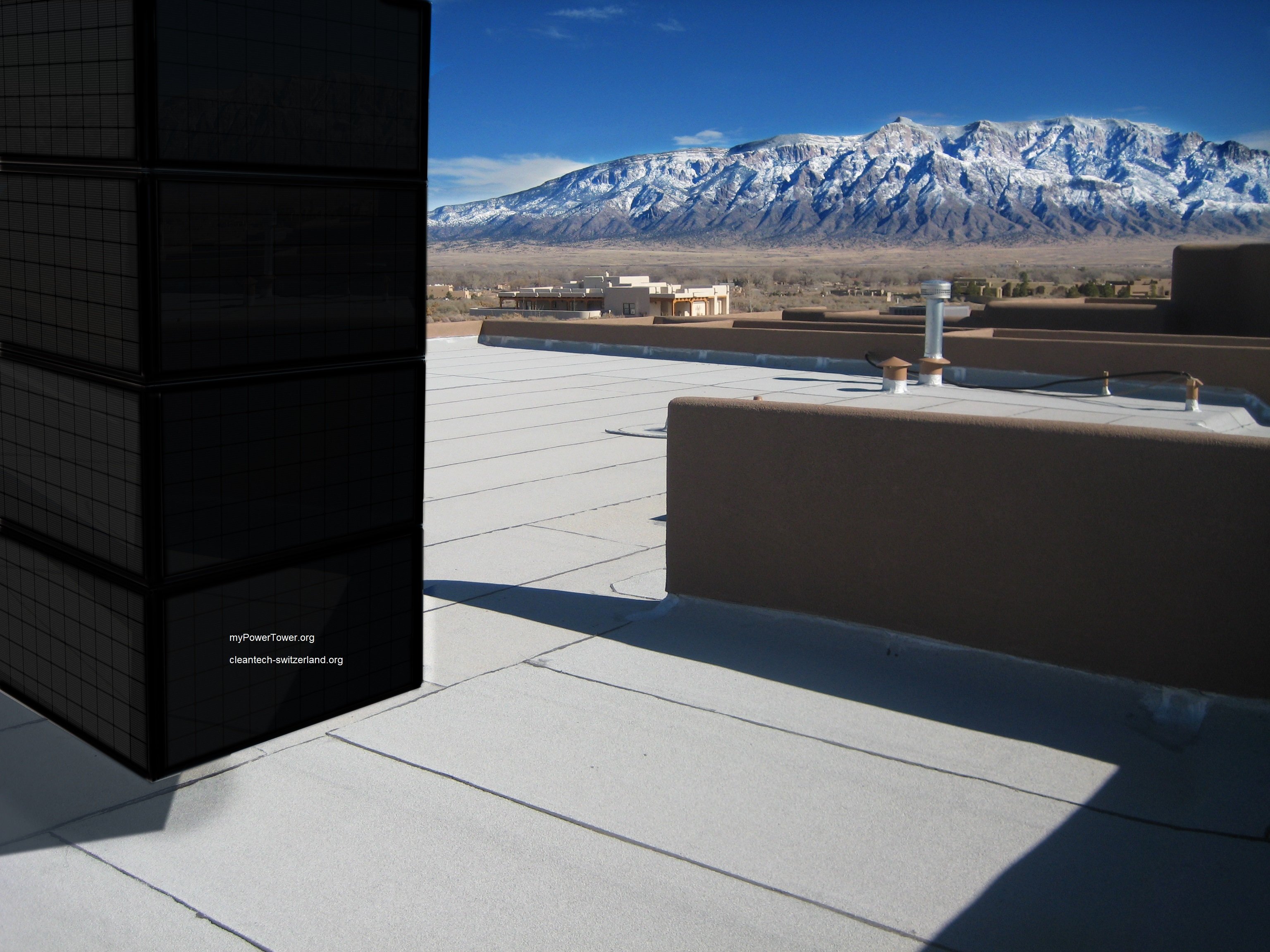 myPowerTower.org by cleantech-shop.org on the roof of a building with black solarpannels
