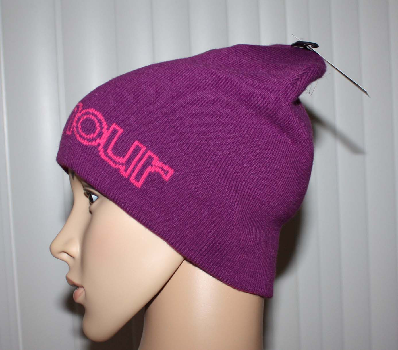 purple hat with pink "Under Armour" stitching (side)