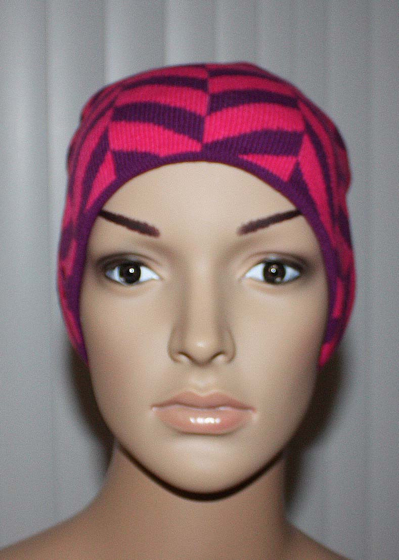 Reversible to a funky purple & pink print (front)
