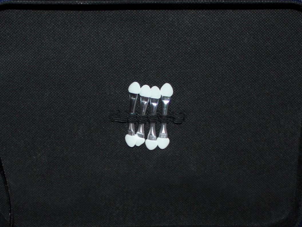 shadow wands from lower zippered compartment