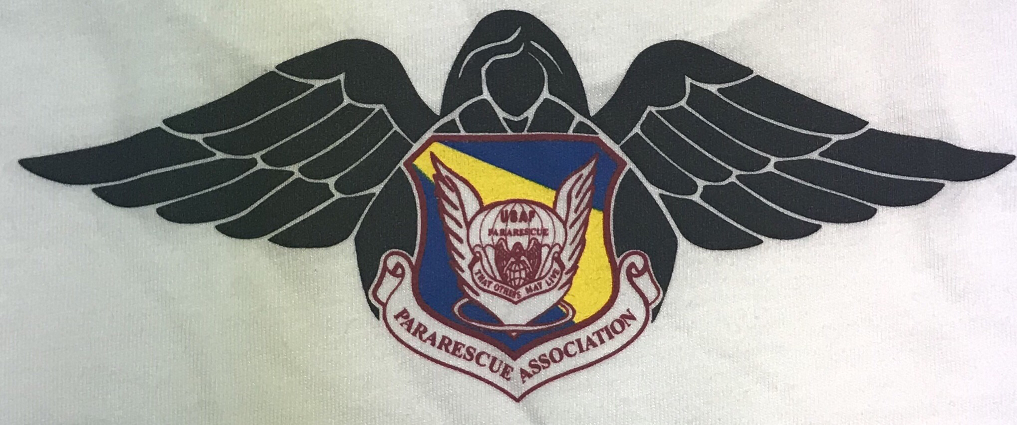 pja/ White T-Shirt with ParaRescue Flash and Tattered Flag left chest. PJ Association “Guardian Angel” on back...Large