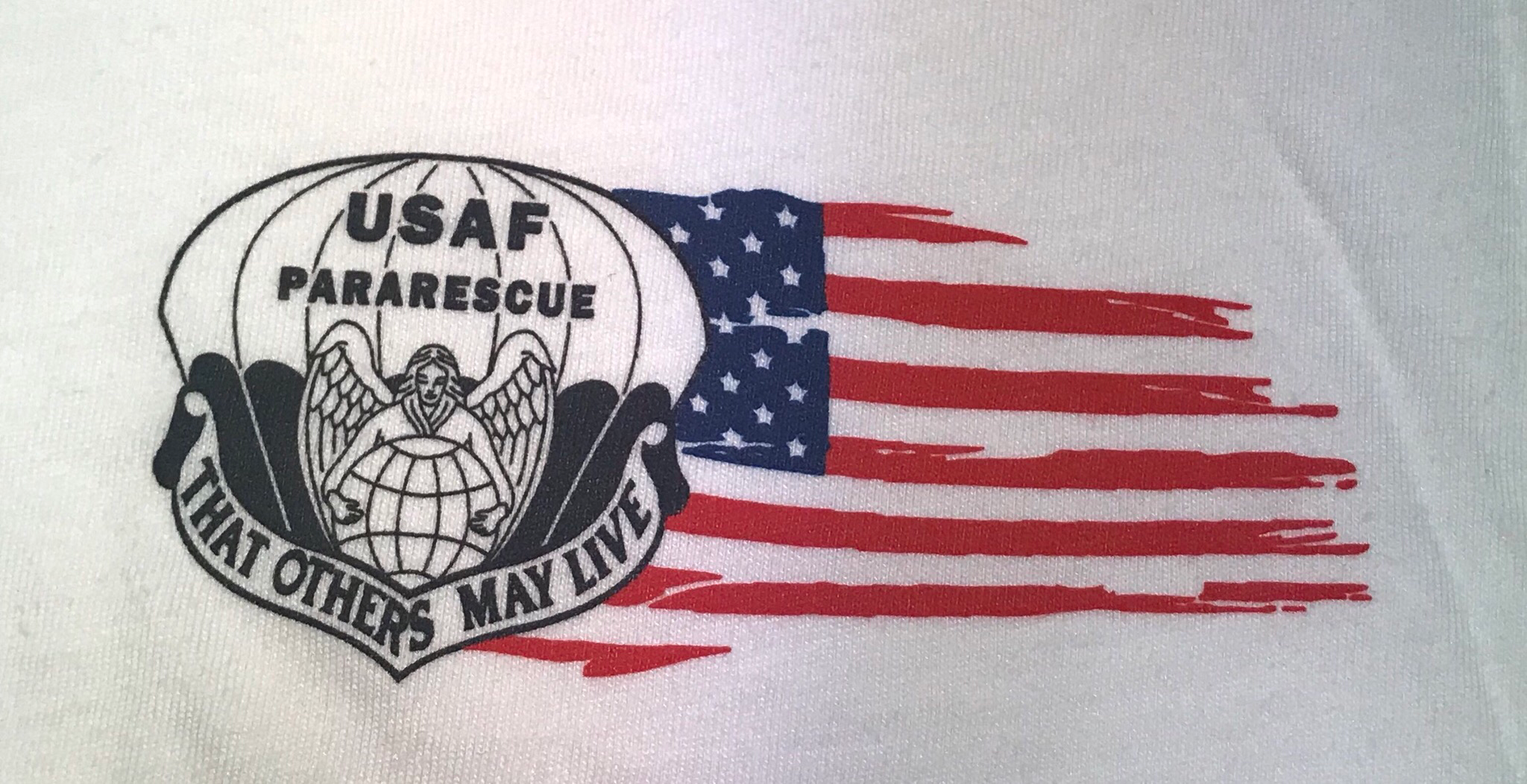 pja/ White T-Shirt with ParaRescue Flash and Tattered Flag left chest. PJ Association “Guardian Angel” on back...Large 01-0043