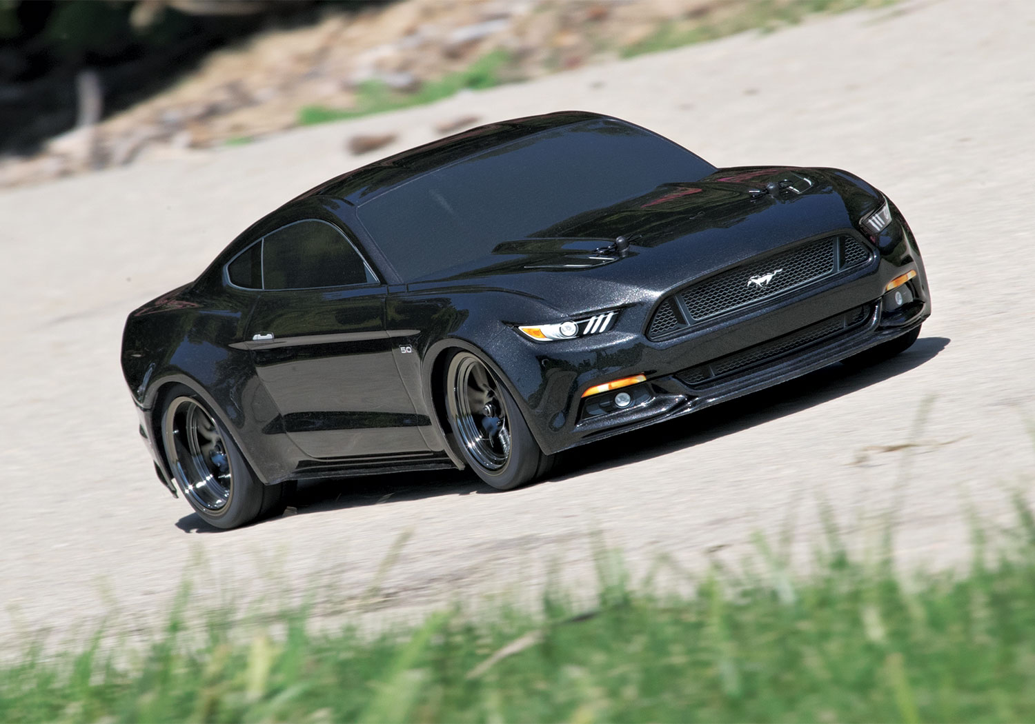 Traxxas Ford Mustang GT XL-5 (TQ/No Batt/No Chg) with Option Green and Orange Drift Wheels and Tires and Spool Assemblies Included Traxxas Ford Mustang GT XL-5 (TQ/No Batt/No Chg) with Option Green and Orange Drift Wheels and Tires and Spool Assemblies Included