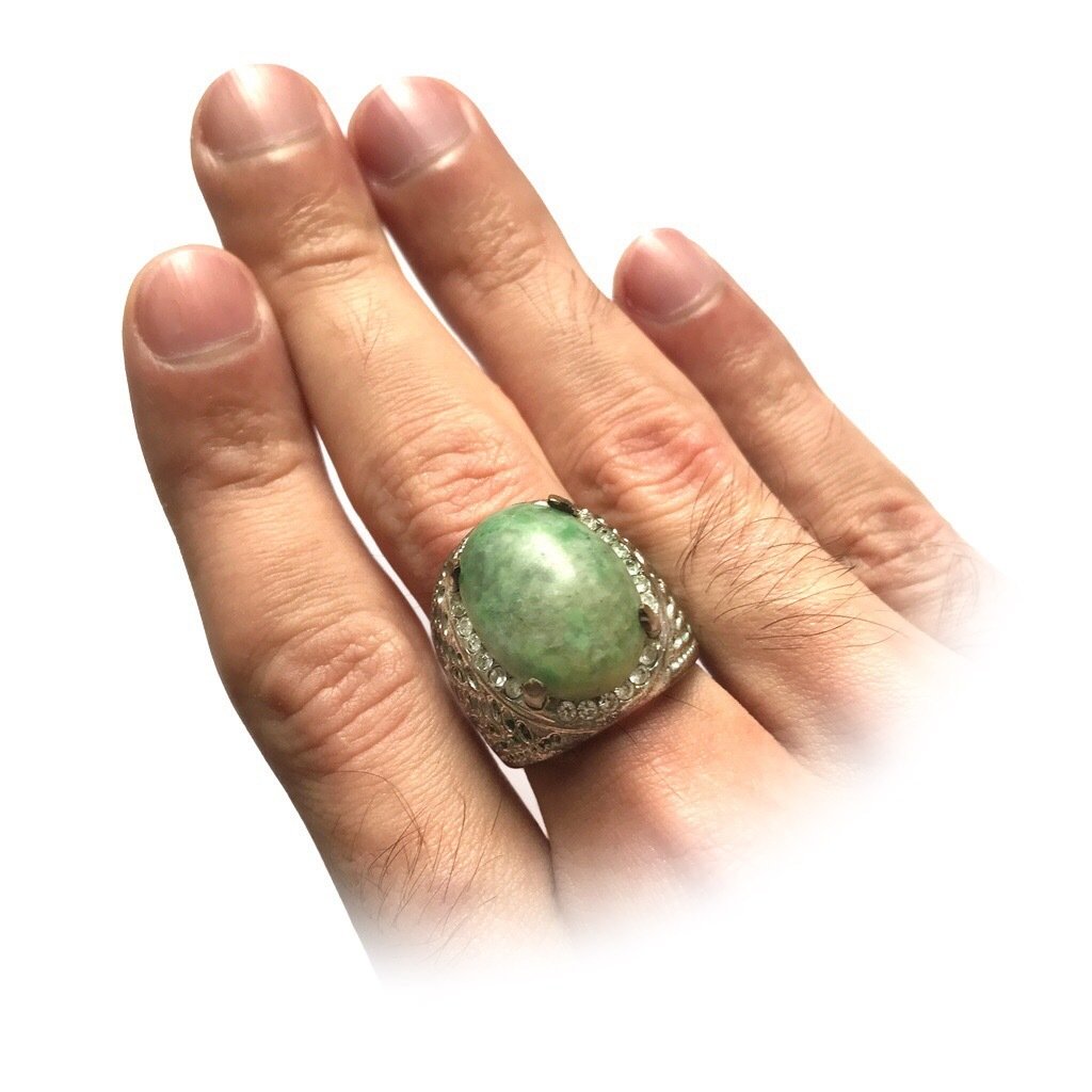 Amulet Ring embedded with Zircons and Nephrite Stone