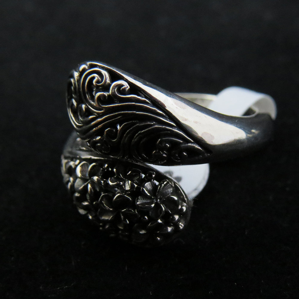 Sterling Silver Cross Over with Frangipani Ring R-09212