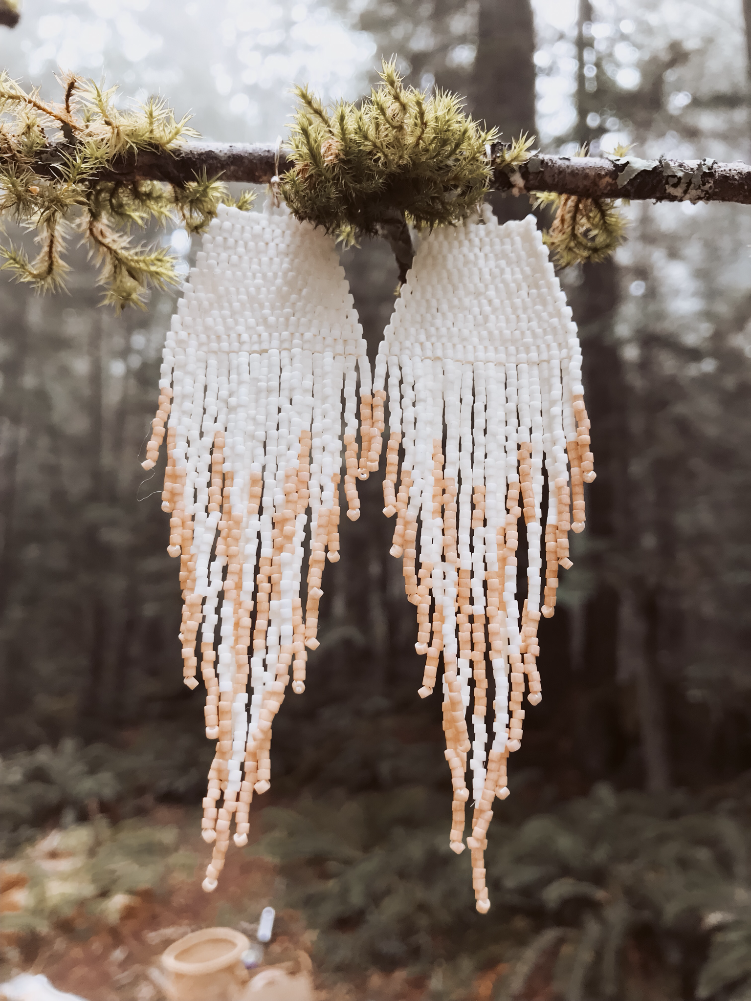 feather fringe earrings in peach