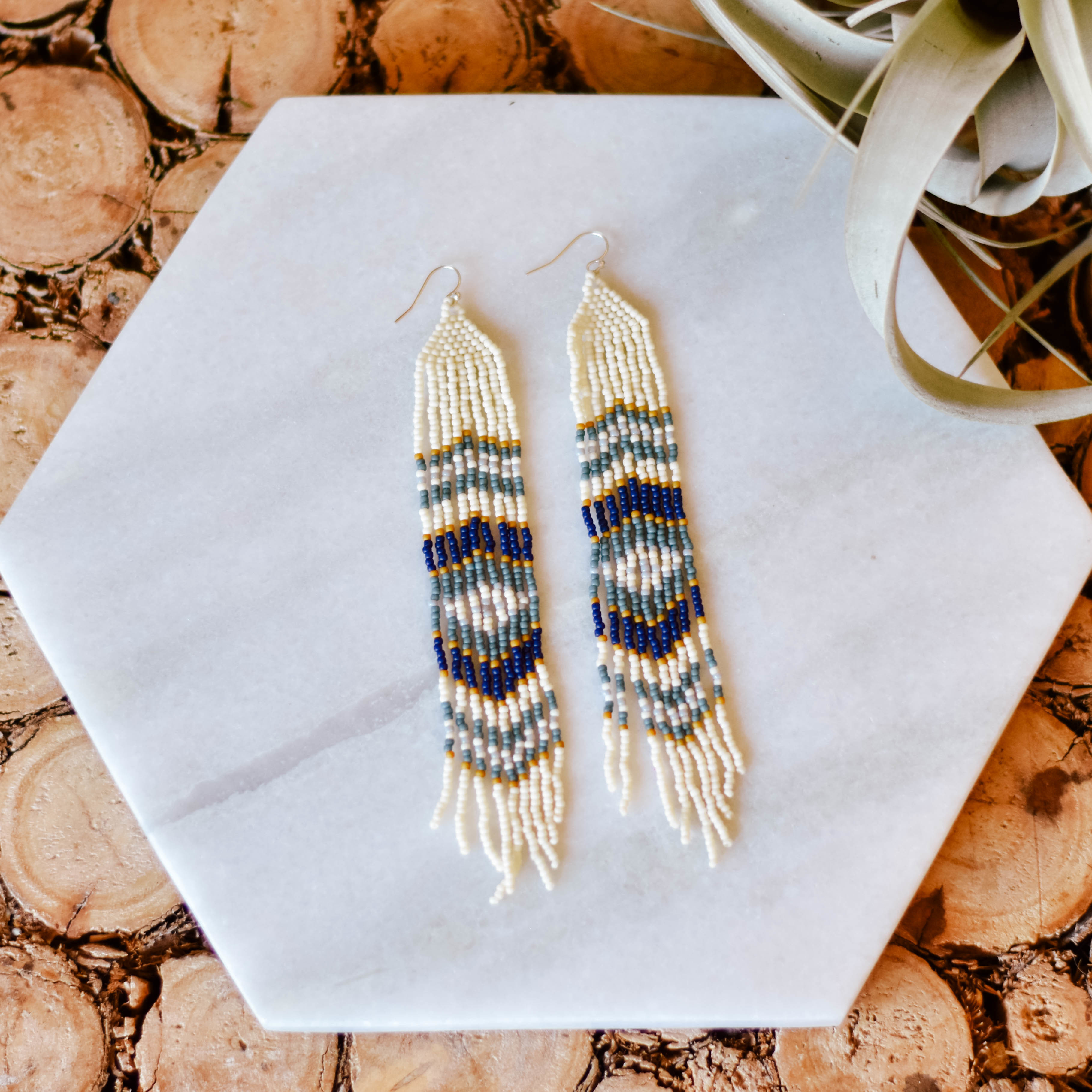 mustard and blue shoulder dusters