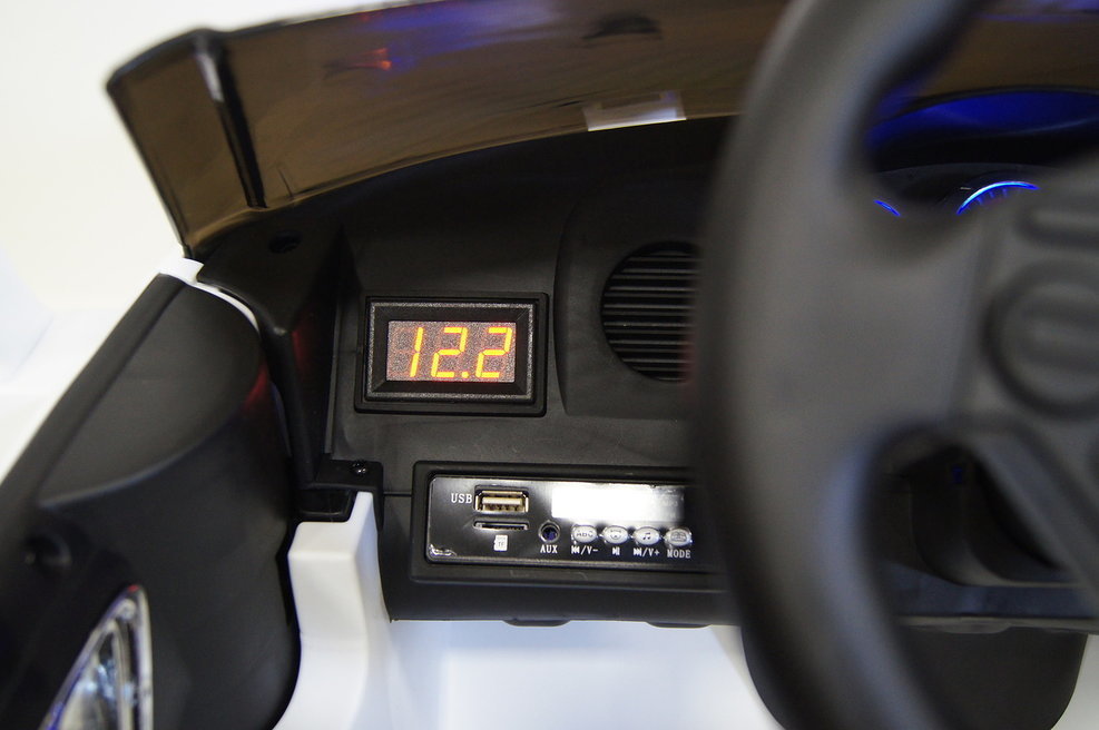 Детский электромобиль Nissan GTR X333XX (ЛИЦЕНЗИОННАЯ МОДЕЛЬ) черный/белый