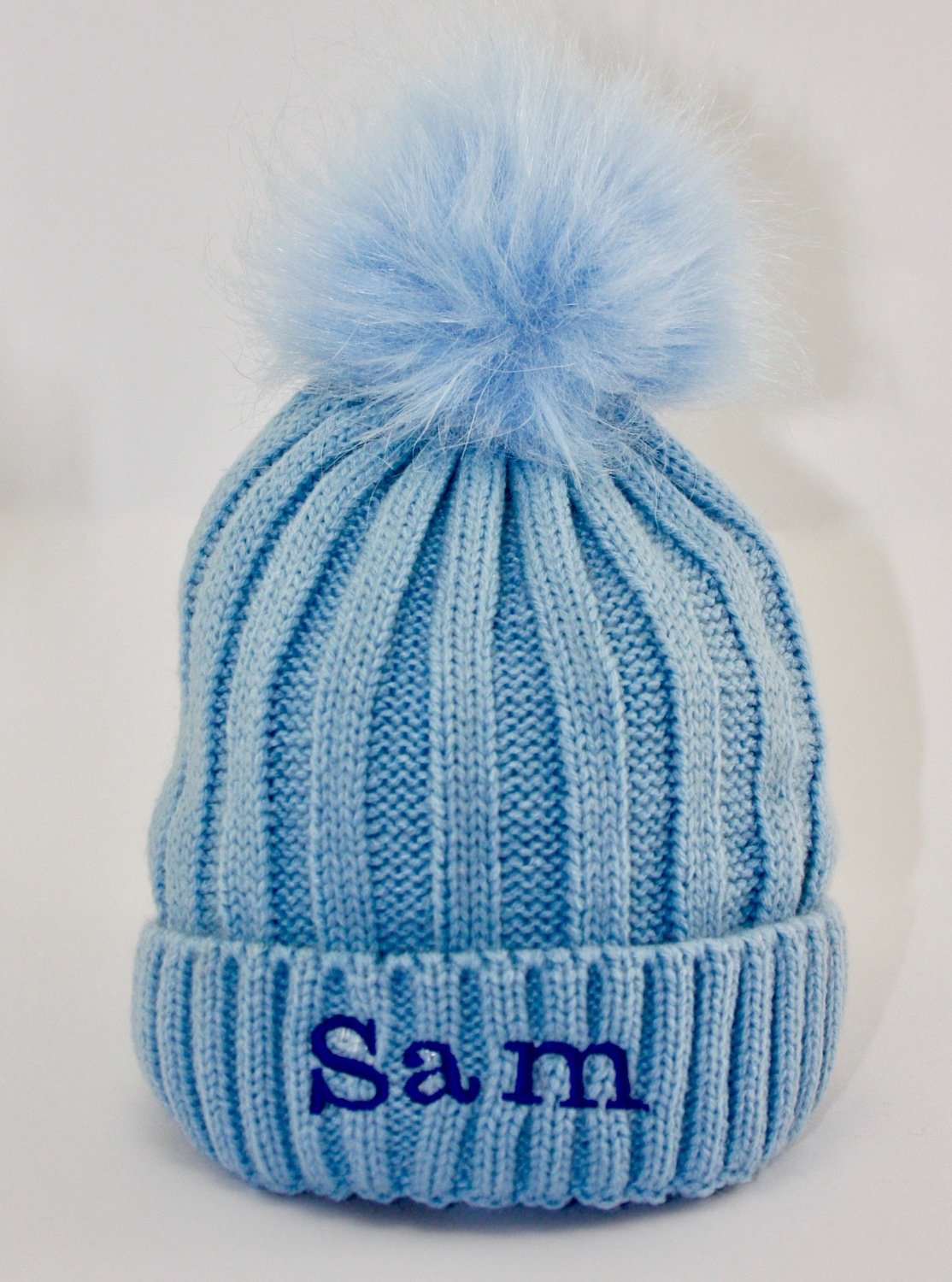 blue bobble hat