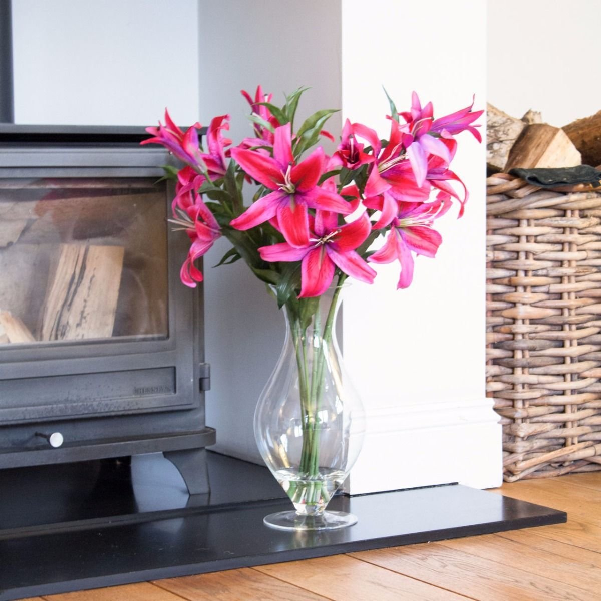 Artificial Dark Pink Casablanca Lilies In A Tall Hourglass Vase