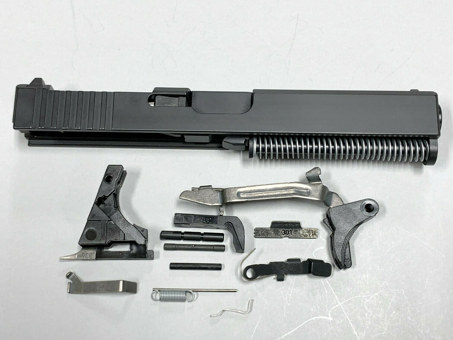 Glock 17 Complete Built Slide w/ Rear Serrations - RMR Trijicon Cut - Color Black - Comes With Glock OEM Lower Parts Kit - Free Shipping Glock 17 Complete Built Slide w/ Rear Serrations - RMR Trijicon Cut - Color Black - Comes With Glock OEM Lower Parts Kit - Free Shipping