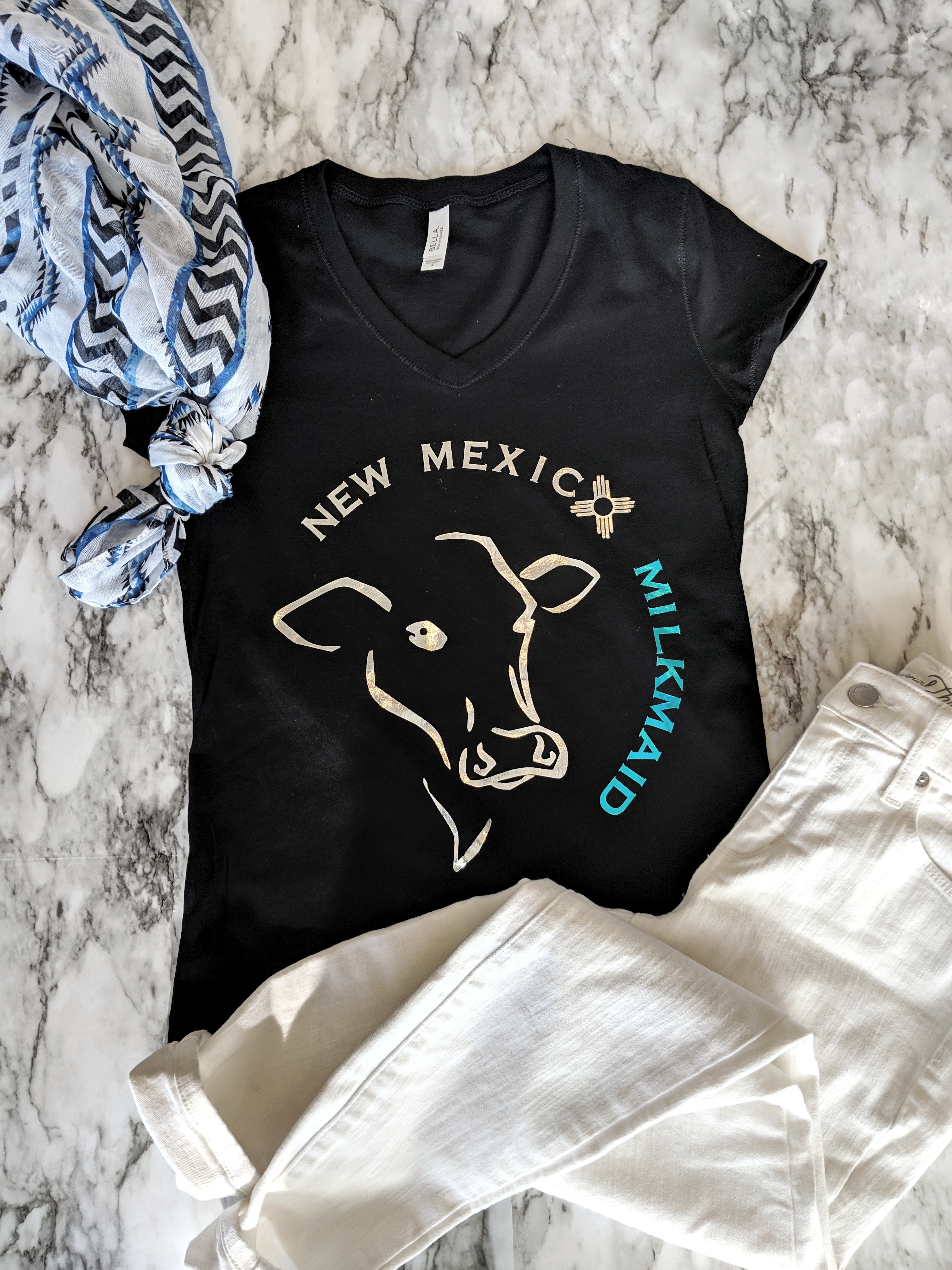 NM Milkmaid Metallic Logo V-Neck 00001