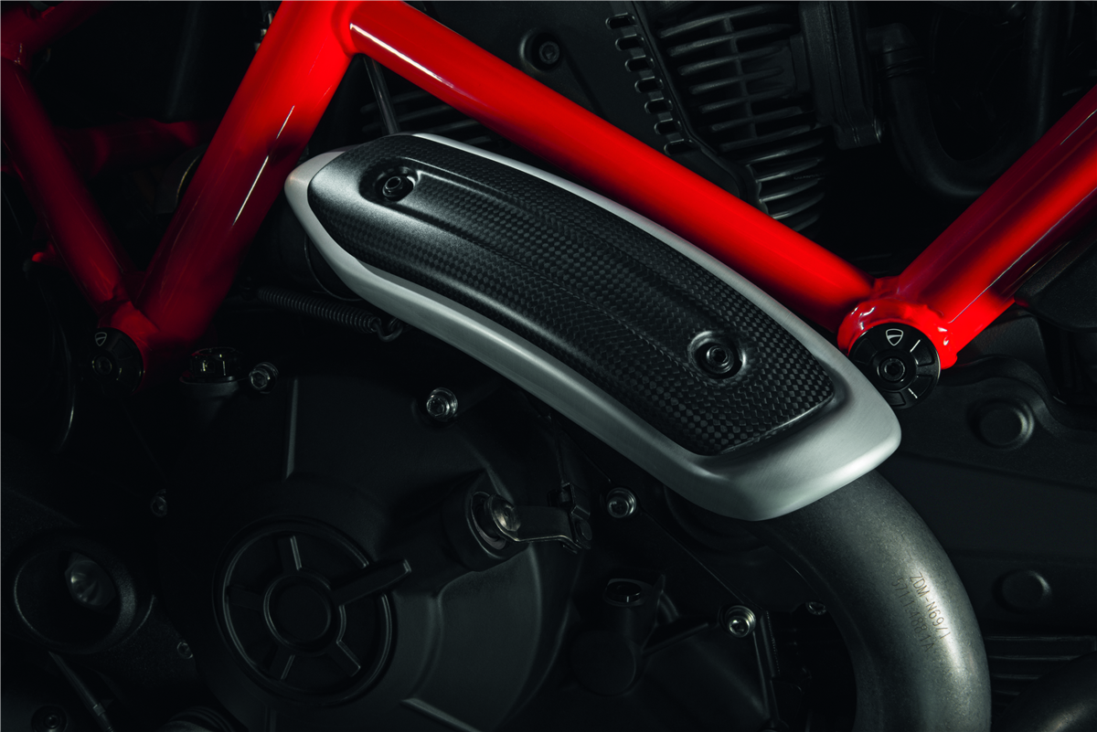Carbon heat guard for standard and racing manifolds.