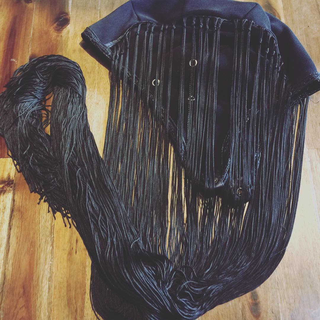 Men's black fringe head cap