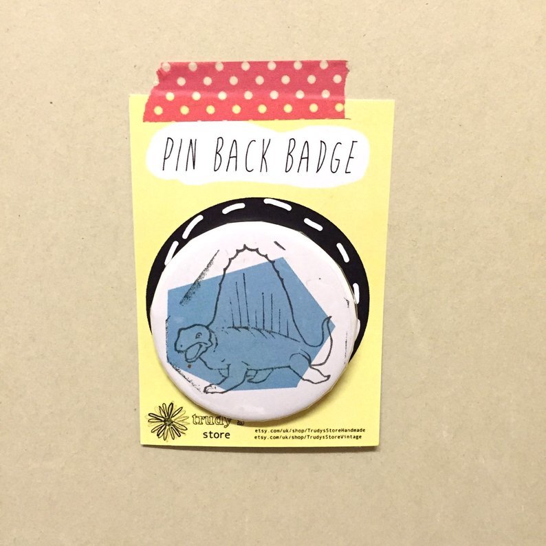 Blue Stegosaurus badge