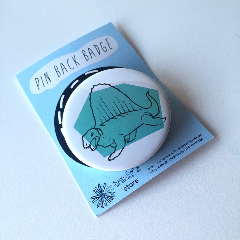 Blue Stegosaurus badge