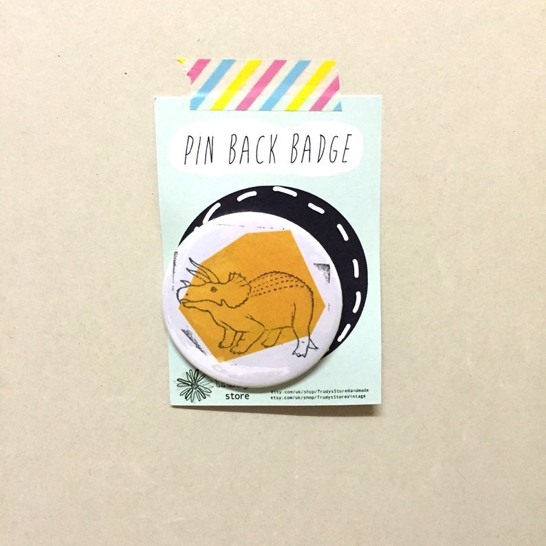 Orange Tricerotops badge