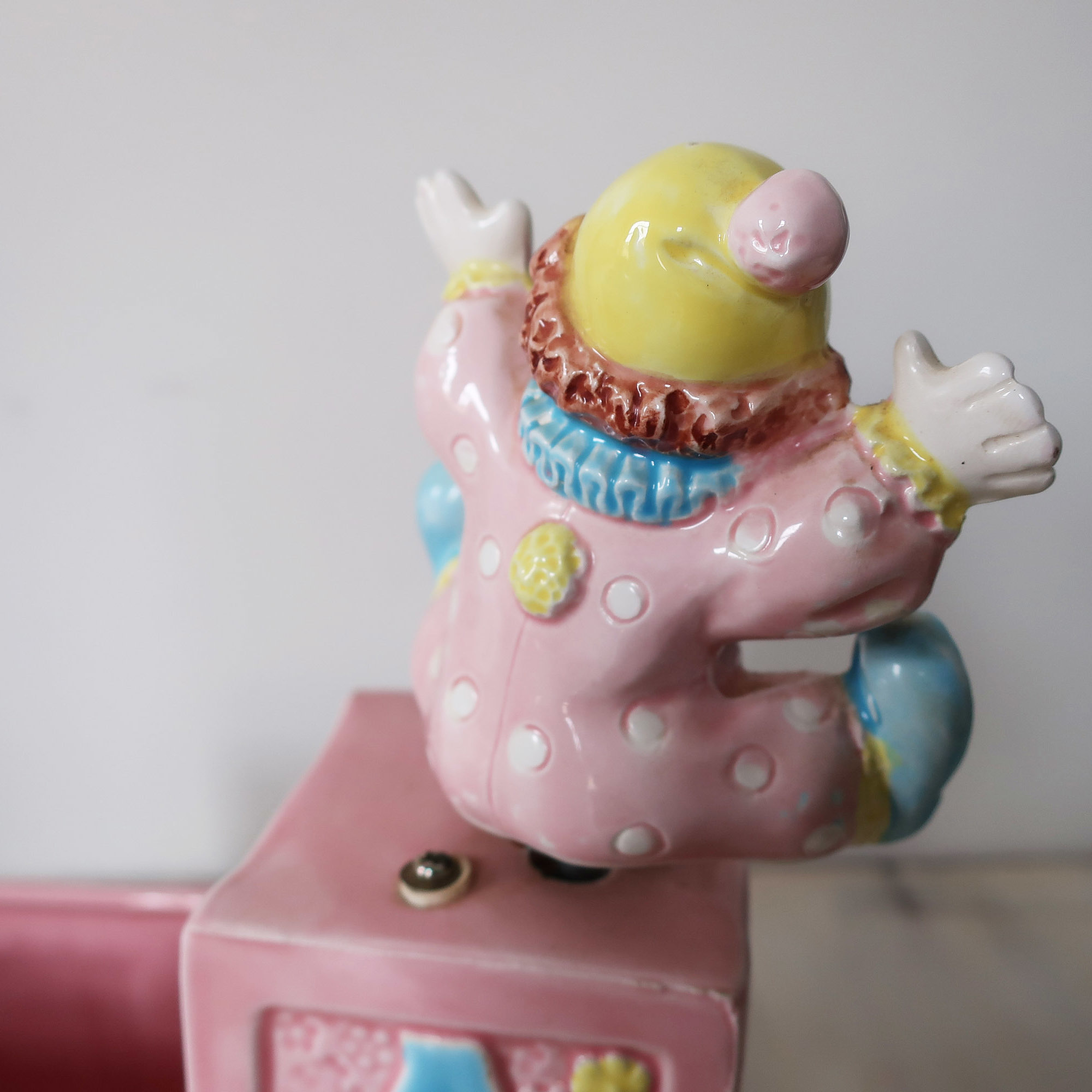 Vintage nursery musical clown planter