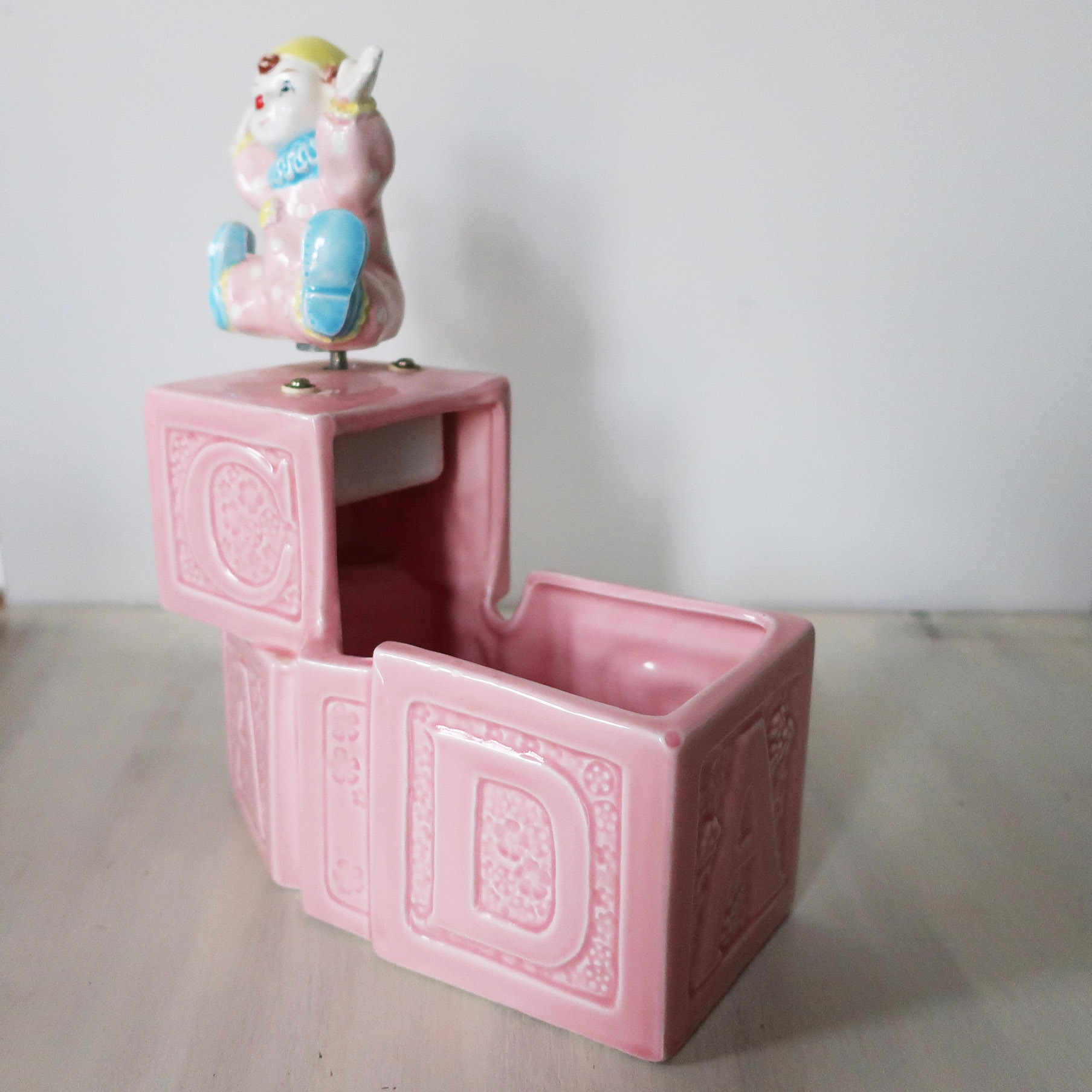 Vintage nursery musical clown planter