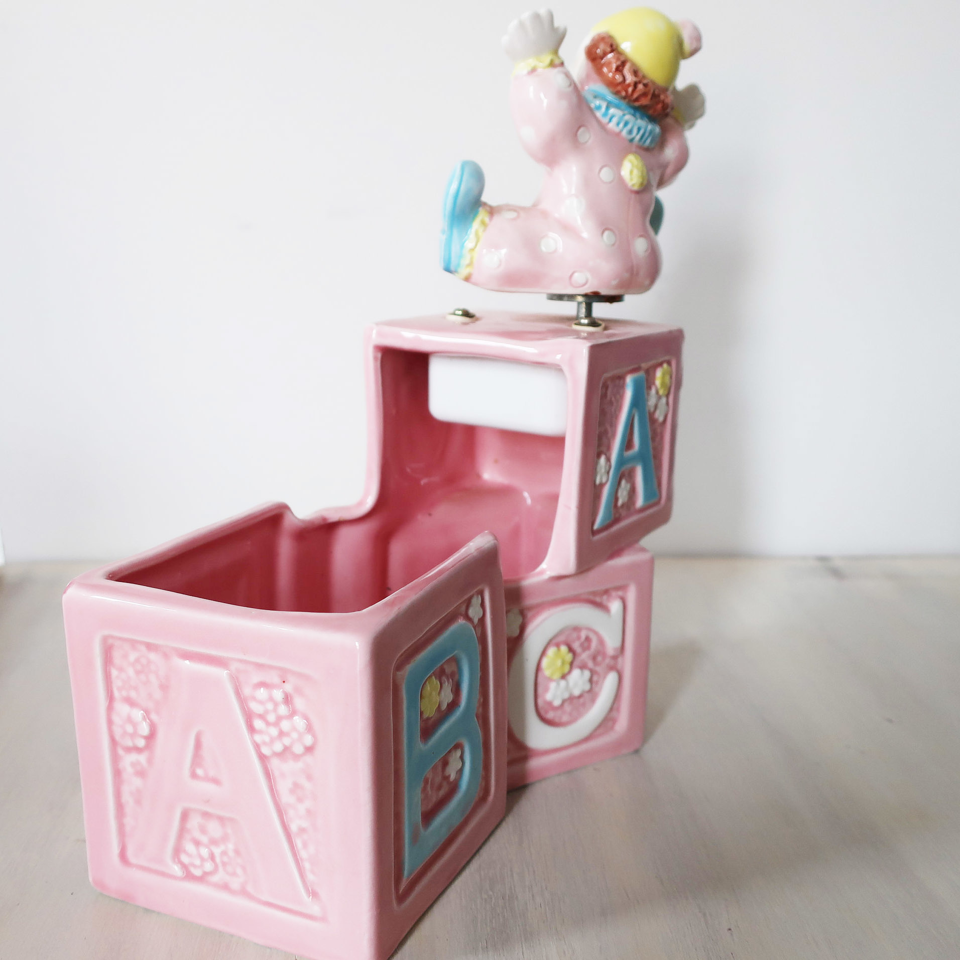 Vintage nursery musical clown planter