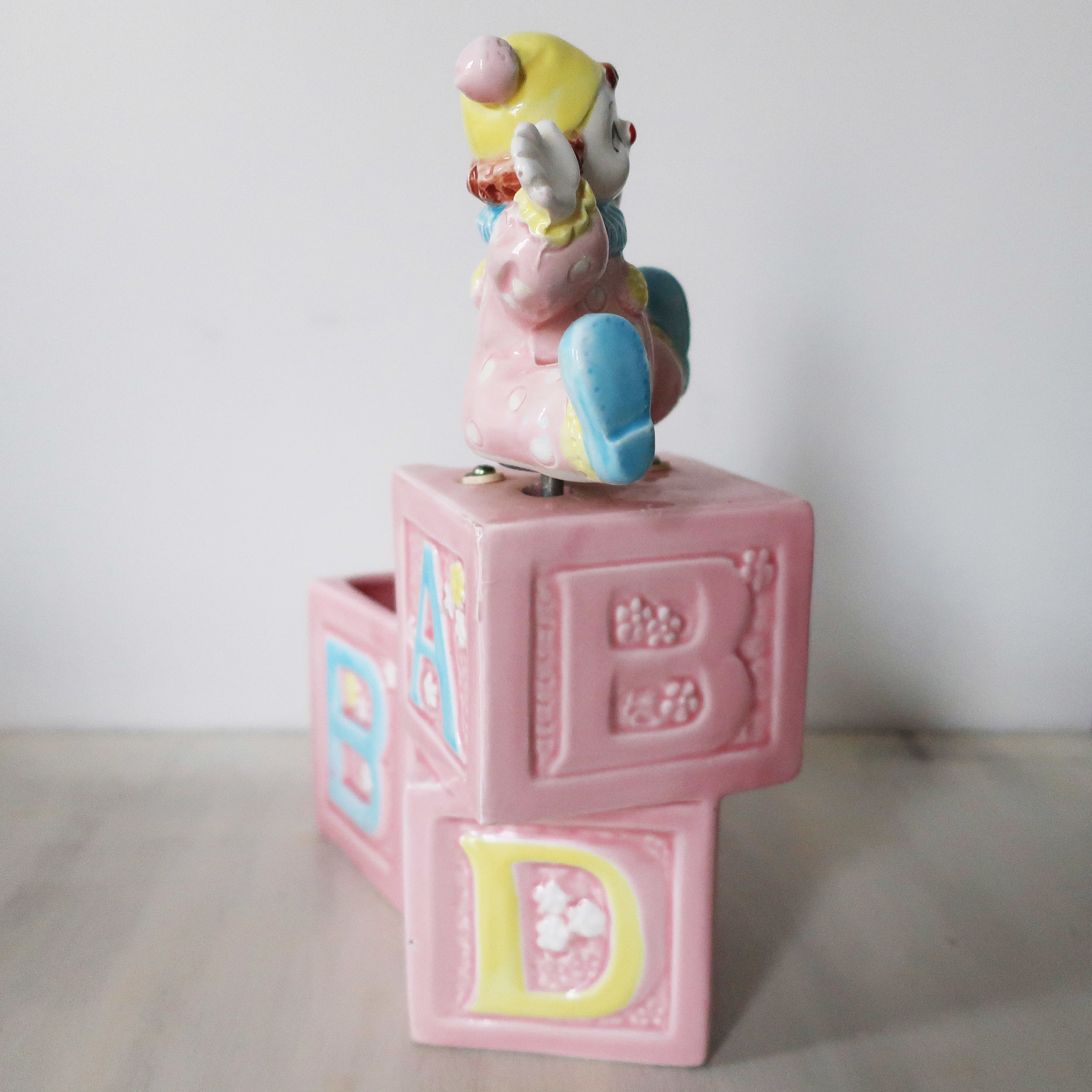 Vintage nursery musical clown planter