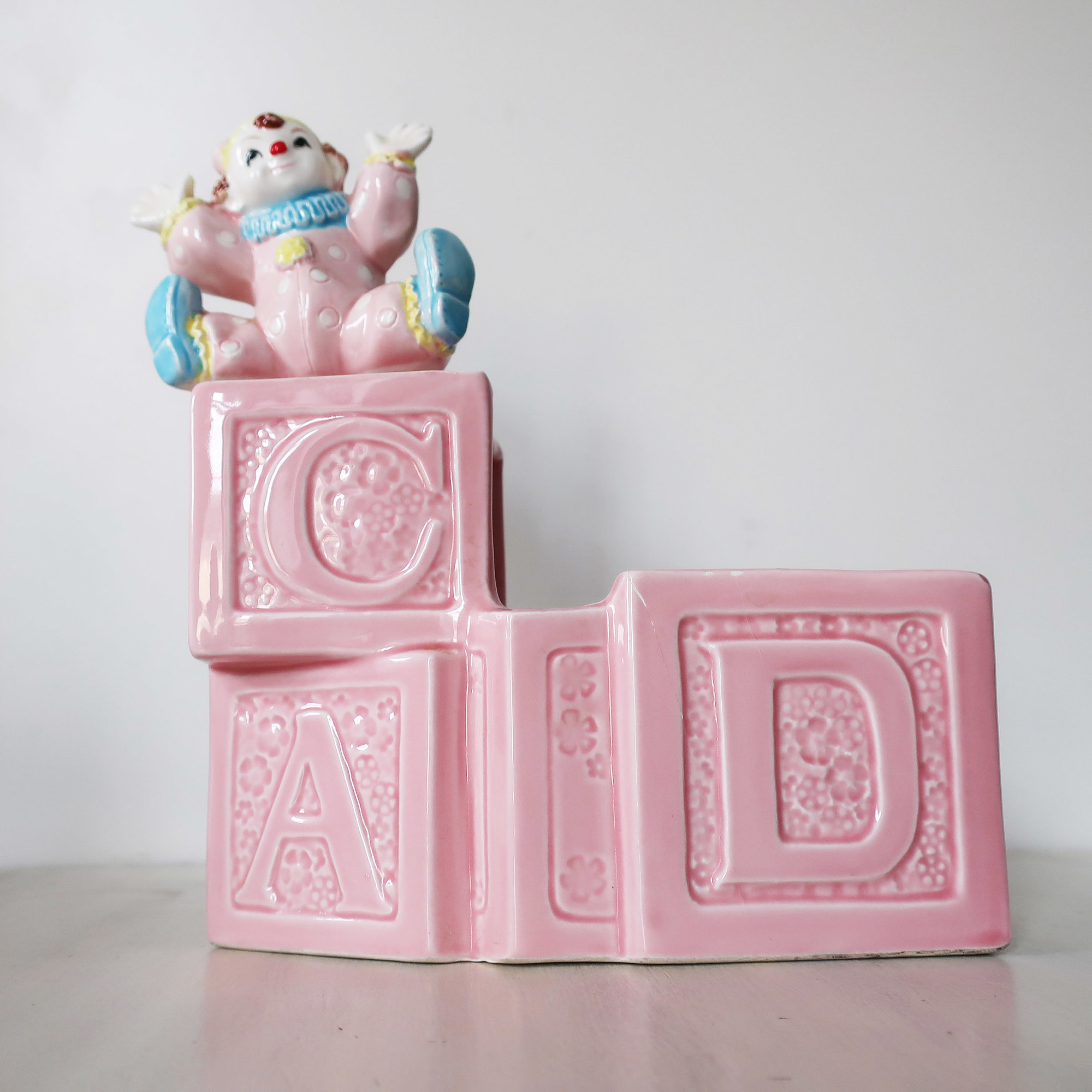 Vintage nursery musical clown planter
