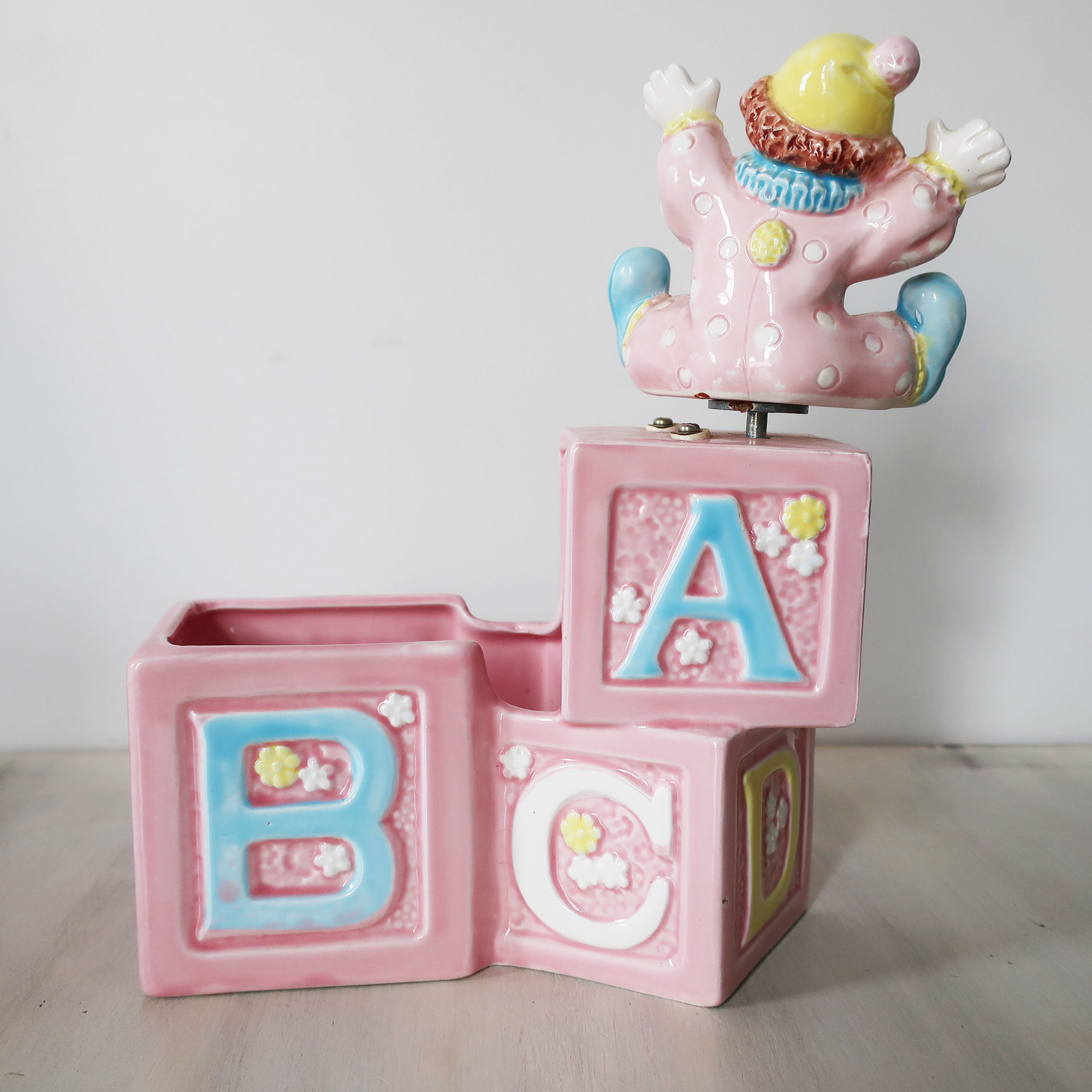 Vintage nursery musical clown planter