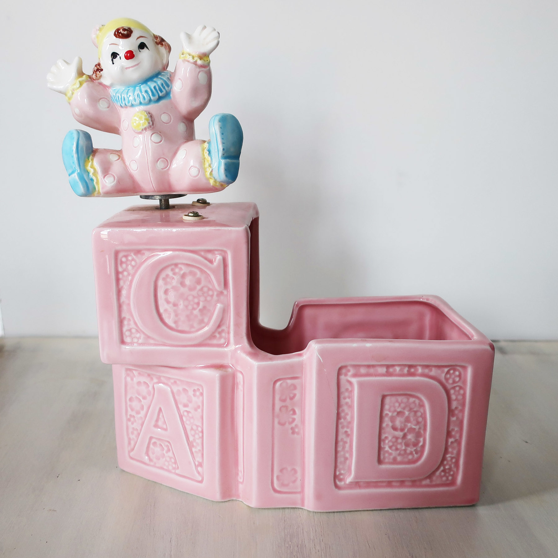 Vintage nursery musical clown planter