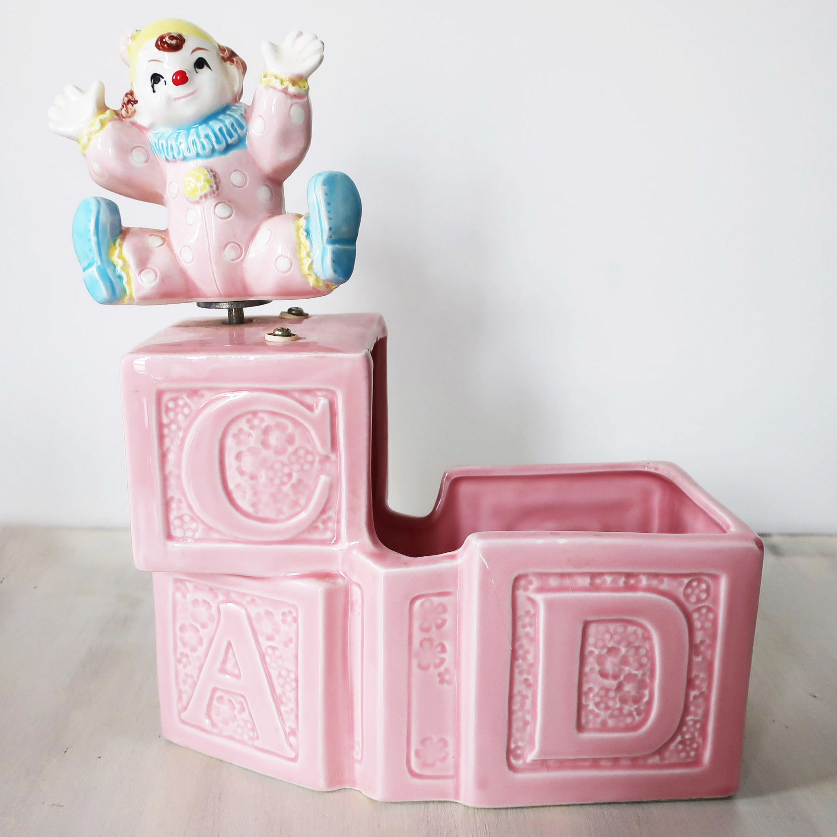 Vintage nursery musical clown planter
