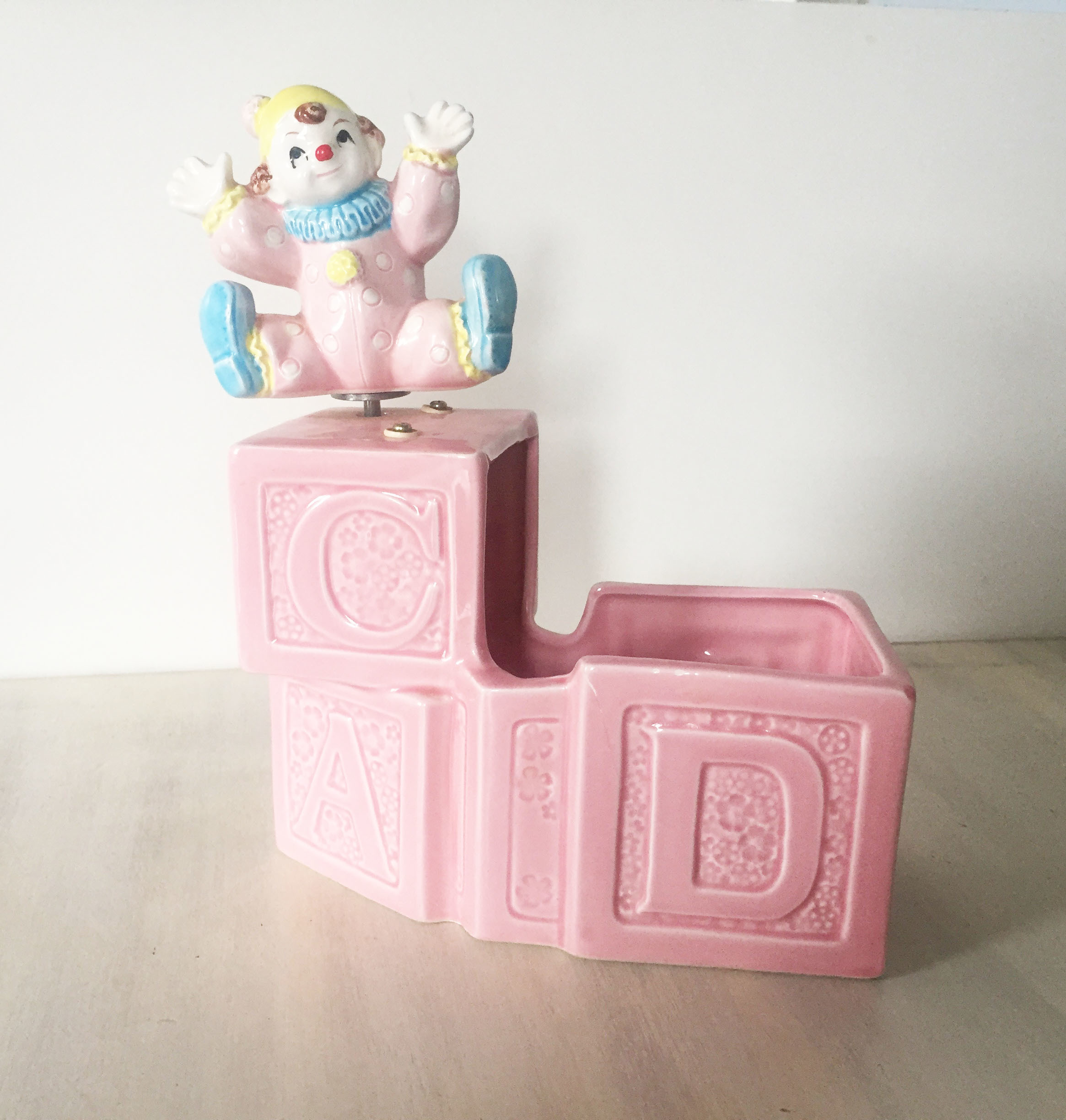Vintage nursery musical clown planter