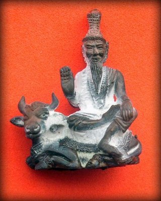 Ruesi Isworn Song Ko (Shiva Ruesi sitting on sacred Nonti Cow) Thai Brahman amulet - Luang Phu Nong, Wat Wang Sri Tong - Nuea Radtana Loha Ruesi Isworn Song Ko (Shiva Ruesi sitting on sacred Nonti Cow) Thai Brahman amulet - Luang Phu Nong, Wat Wang Sri Tong - Nuea Radtana Loha