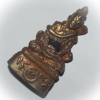 Pra Ngang Hmeun Montr (Ngang with ten thousand prayer incantations) - Nuea Albaca Fang Takrut Diaw (single Takrut spell) - 3 inches high - Ajarn Kom Traiwaes 2554 BE Pra Ngang Hmeun Montr (Ngang with ten thousand prayer incantations) - Nuea Albaca Fang Takrut Diaw (single Takrut spell) - 3 inches high - Ajarn Kom Traiwaes 2554 BE