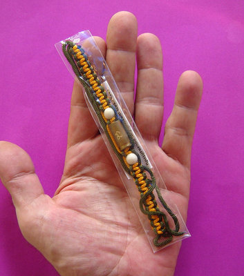 Takrut Look Pern Gan Pay Taep Sastrawut (Bullet Takrut wristband) - Run Ruay Ngern Ruay Tong (rich in silver and gold edition) Kong Grapan + Choke Lap - Luang Por Rit (Wat Chonlapratan) 2547 Takrut Look Pern Gan Pay Taep Sastrawut (Bullet Takrut wristband) - Run Ruay Ngern Ruay Tong (rich in silver and gold edition) Kong Grapan + Choke Lap - Luang Por Rit (Wat Chonlapratan) 2547