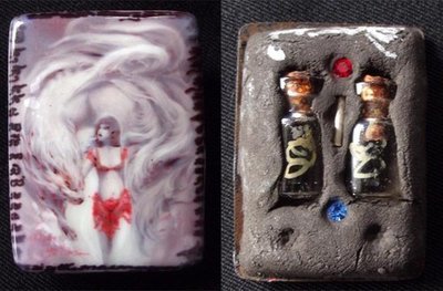 Nang Jing Jork Gao Hang 9 Tailed Fox Tail Lady Ghost Locket with Super Concentrated Prai Powders and double Prai Oil flasks with gemstones in rear face - Takrut spell insert - Kroo Ba Beng Nang Jing Jork Gao Hang 9 Tailed Fox Tail Lady Ghost Locket with Super Concentrated Prai Powders and double Prai Oil flasks with gemstones in rear face - Takrut spell insert - Kroo Ba Beng