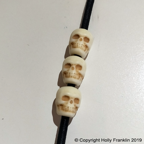 Black : Black - Bone Skulls 1-UP_black-boneskulls