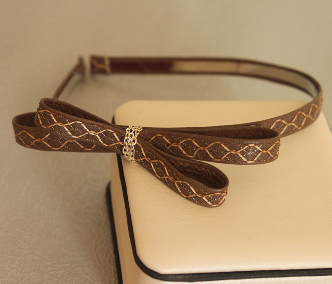 Faux leather bow-tie headband