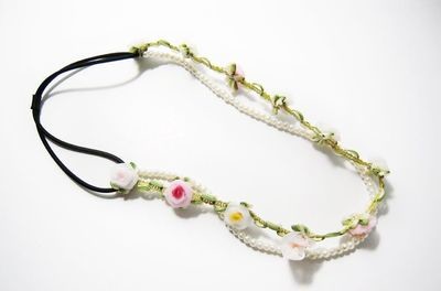 Silk flowers & white pearls elastic headband Silk flowers & white pearls elastic headband