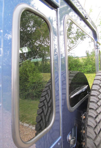 Dark-Tinted Rear Quarter Glass Windows for Land Rover Defender 90 and 110 (Oval Shape)