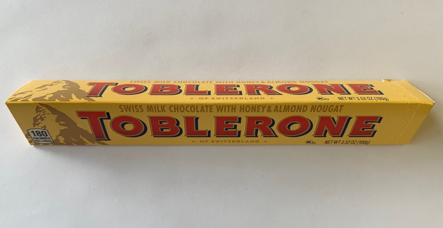 Toblerone Swiss Milk Chocolate Honey & Almond Nougat Bar Toblerone Swiss Milk Chocolate Honey & Almond Nougat Bar