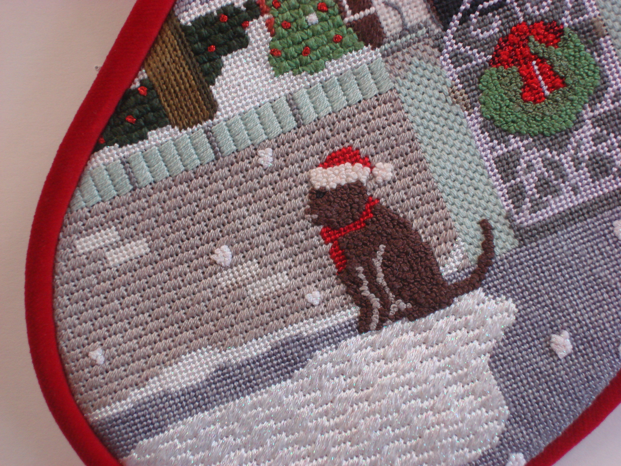 Christmas Townhouse Sock, model shown (hand painted by Mary Lake Thompson)