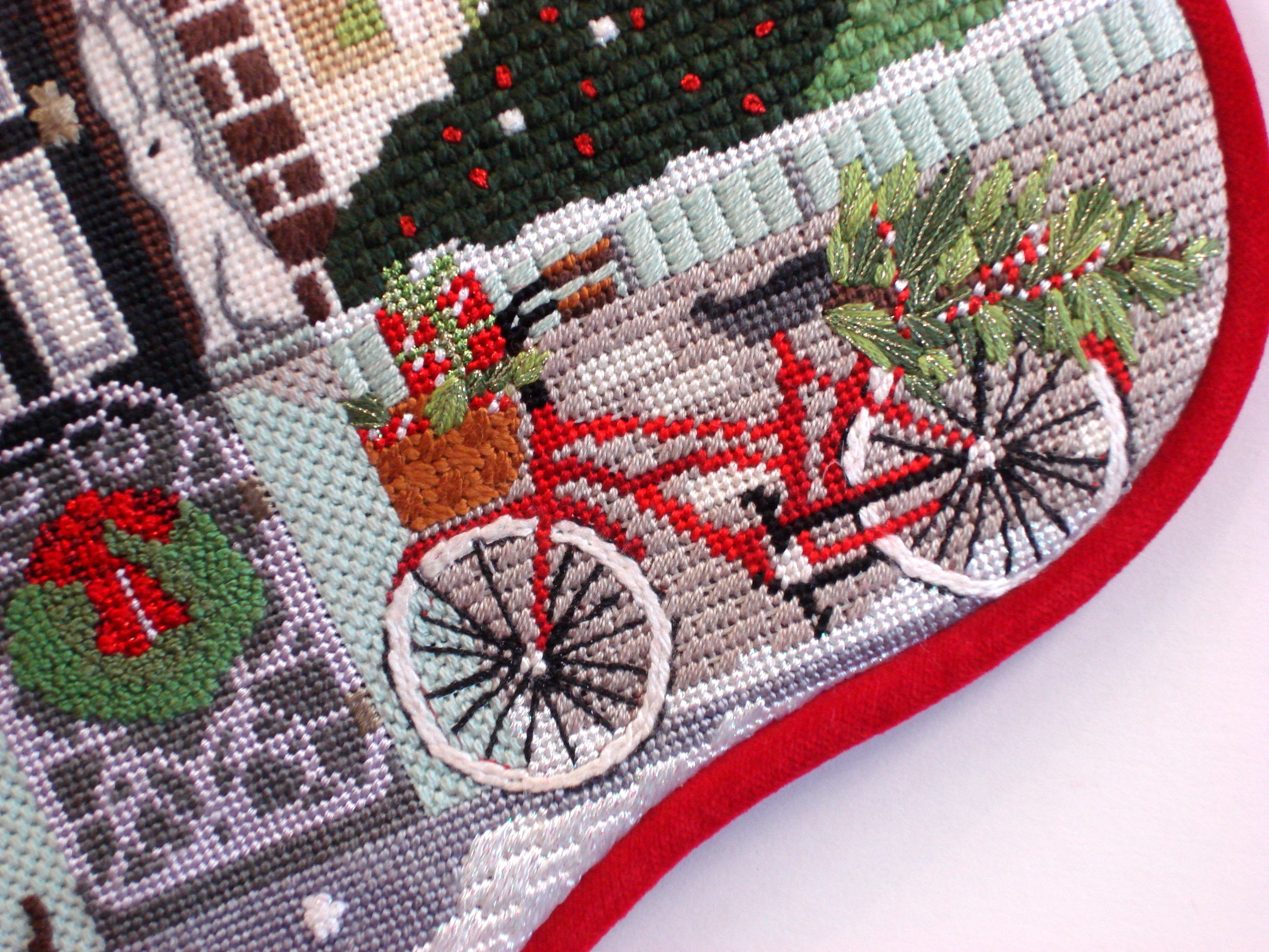 Christmas Townhouse Sock, model shown (hand painted by Mary Lake Thompson)