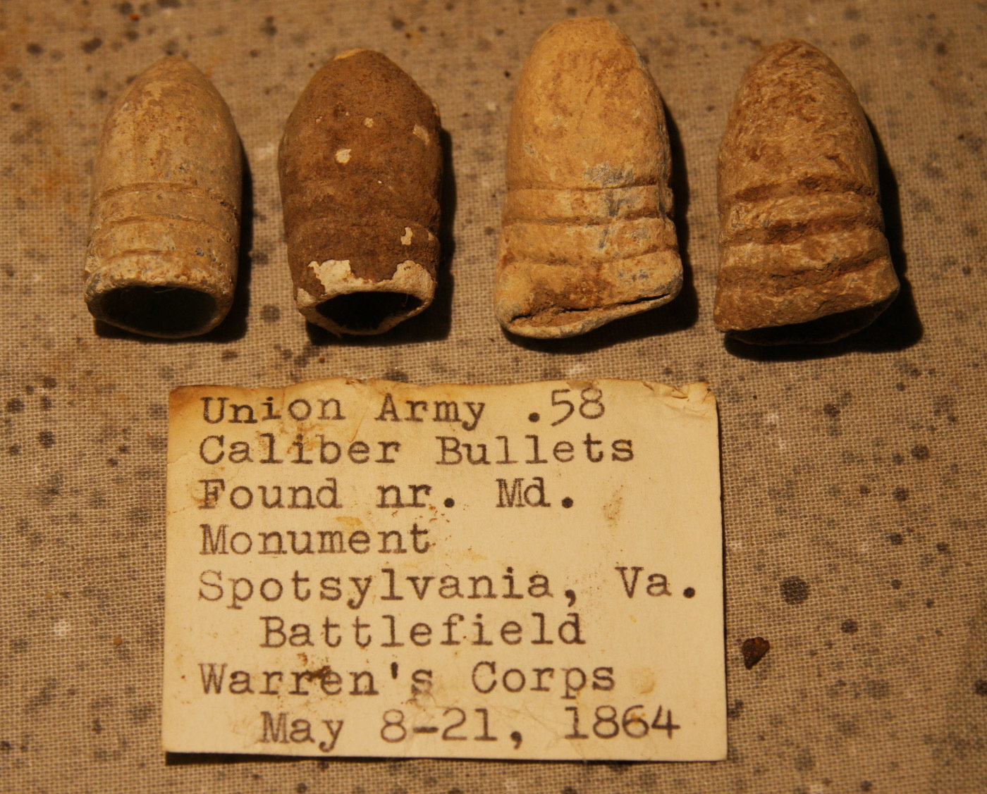 JUST ADDED ON 5/20 - THE BATTLE OF SPOTSYLVANIA / LAUREL HILL/MARYLAND MONUMENT - Four .58 Caliber Bullets Including a Swage & CS with Original Collector's Typed Label RG-SP300