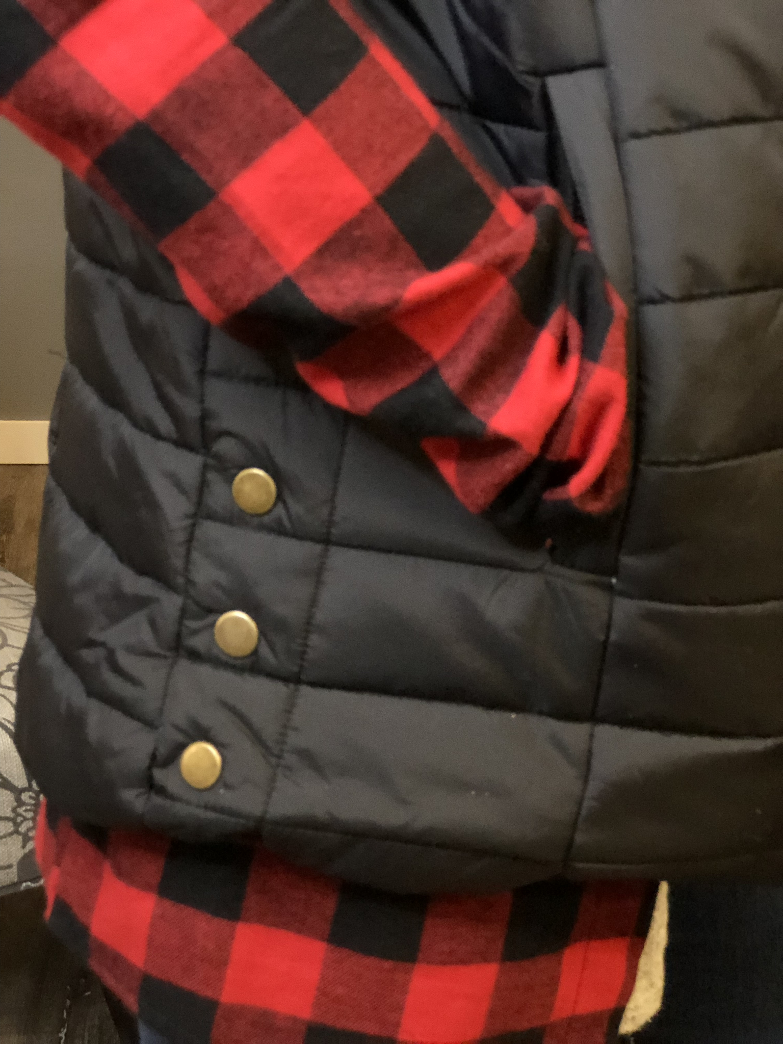 Black quilted vest