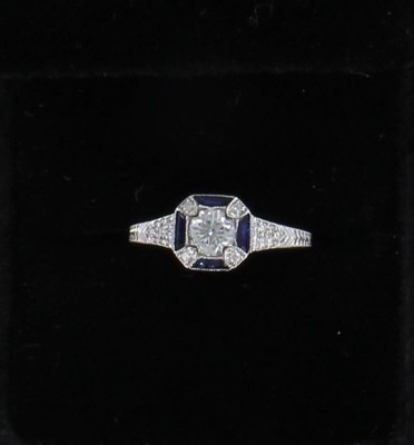 18KTW DIAMOND AND SAPPHIRE ENGAGEMENT RING 18KTW DIAMOND AND SAPPHIRE ENGAGEMENT RING