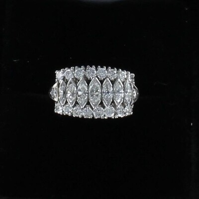 PLATINUM MARQUISE AND ROUND DIAMOND RING PLATINUM MARQUISE AND ROUND DIAMOND RING