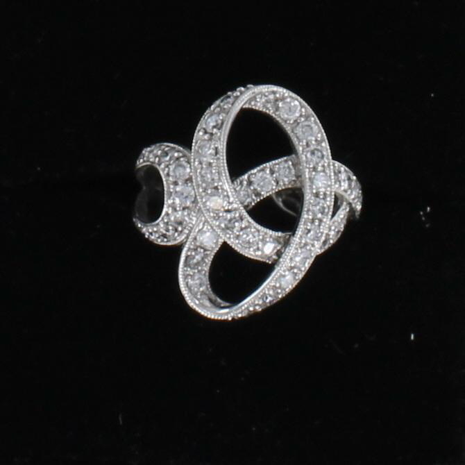 14KT DIAMOND SWIRL RING