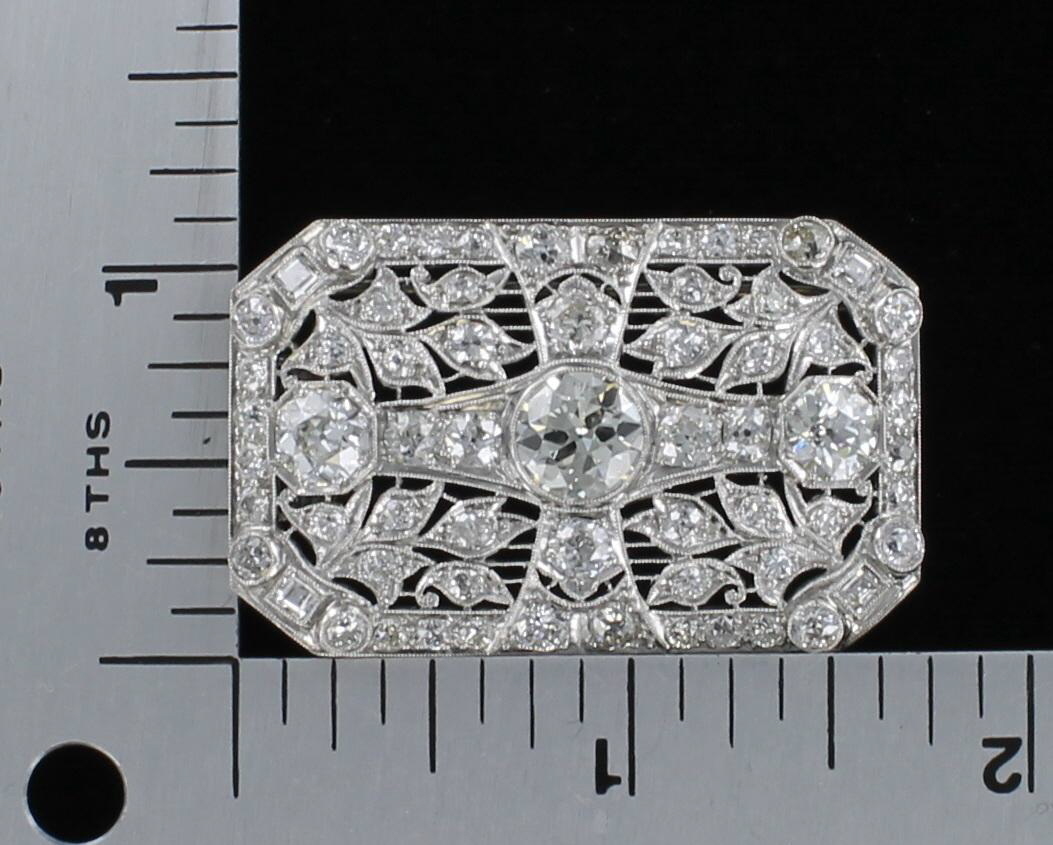 PLATINUM 7.0 CT TW DIAMOND PENDANT/PIN CIRCA 1920