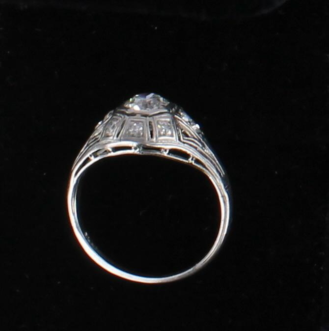 PLATINUM .65 CT OLD EUROPEAN DIAMOND ENGAGEMENT RING, CIRCA 1920