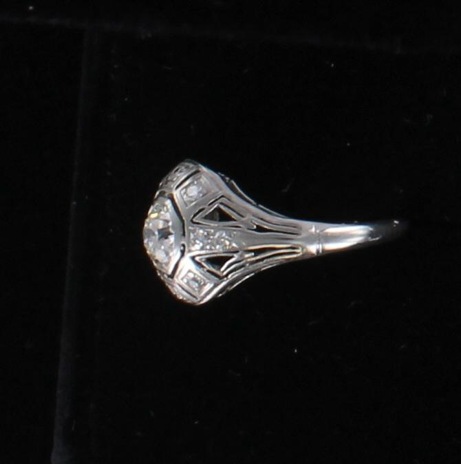 PLATINUM .65 CT OLD EUROPEAN DIAMOND ENGAGEMENT RING, CIRCA 1920