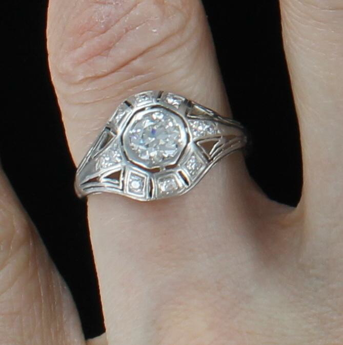 PLATINUM .65 CT OLD EUROPEAN DIAMOND ENGAGEMENT RING, CIRCA 1920